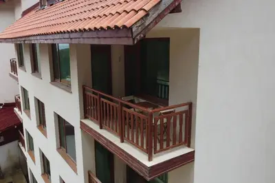an external view of a building with a balcony at Apartment Atanasov - Pamporovo in Pamporovo
