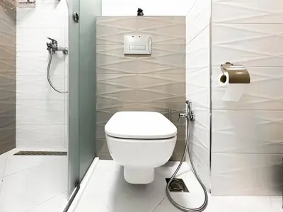 a bathroom with a toilet and a shower at Nomad Friendly Modern Complex Next to Metro in Sofia