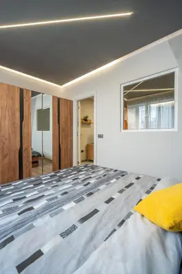 a bedroom with a large bed in a room at Cozy Homes 4 in Sofia