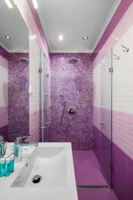 a purple bathroom with a sink and a shower at Feel at Home - Central 2BD Flat with Parking by Flat Mаnager in Sofia
