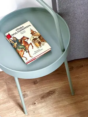 a book sitting on top of a table at Bohemian Hideaway Historic Center Sofia Parking in Sofia