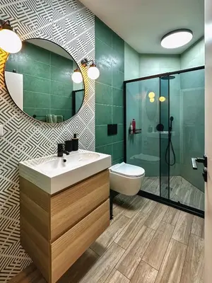 a bathroom with a sink and a mirror and a toilet at Bohemian Hideaway Historic Center Sofia Parking in Sofia