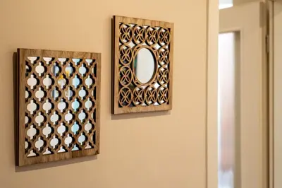 a mirror hanging on a wall next to a door at Home in Sofia's Beating Heart in Sofia