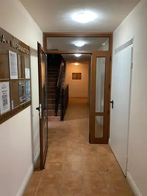 a hallway with a hallway leading to a stairway at Pamporovo mountain apartment in Pamporovo