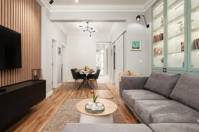 a living room with a couch and a table at Brand New 2 bdr Luxury Apartment in Top Centre in Sofia