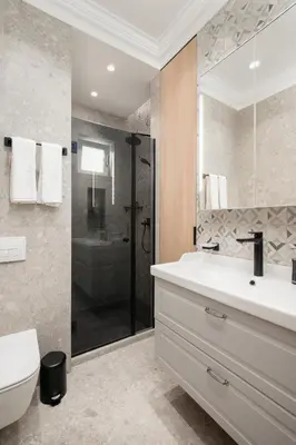 a bathroom with a sink and a toilet and a shower at Brand New 2 bdr Luxury Apartment in Top Centre in Sofia