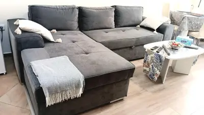 a living room with a couch and a table at Doble next to Bulgaria mall, FREE underground parking in Sofia