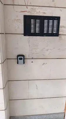 a bathroom with a soap dispenser on a wall at Doble next to Bulgaria mall, FREE underground parking in Sofia