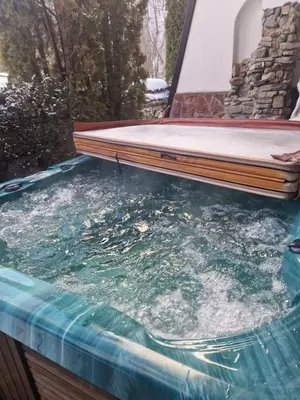 a pool of water with a mattress on top of it at Къща за гости Бели Вит in Ribarica