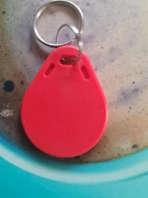 a red heart keychain in a pot of water at Cozy studio with balcony in Sofia