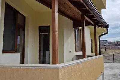 a house being constructed with windows and wooden beams at Апартамент Недялкови II in Sandanski