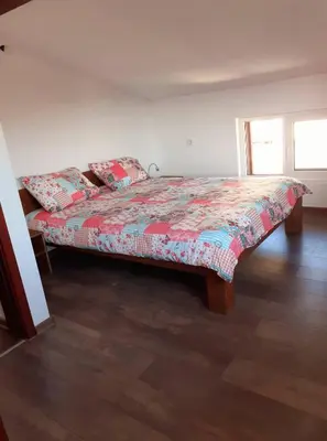 a bedroom with a bed in a room at Sokol i Kalina spa in Pchelin