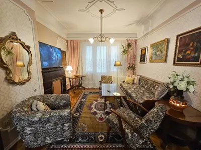 a living room with a couch and chairs and a table at Alex Place-Central Sofia in Sofia