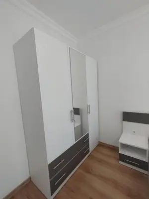 a room with a large mirror and a white wall at Stylish apartment Zingara 2 in Sofia