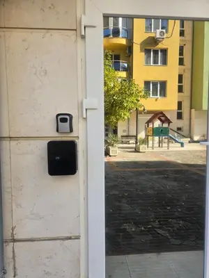 a door with a mailbox on the side of a building at Roses in Sofia