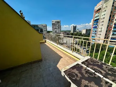 a balcony of a building with a view of a city at Student Town 1BDR APT in Sofia