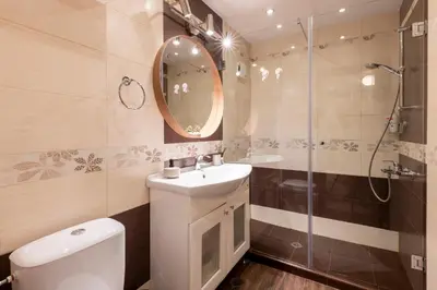 a bathroom with a toilet and a sink and a shower at My Place in Sofia