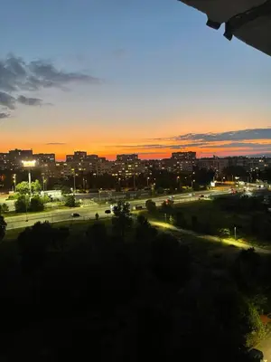 a view of a city skyline at sunset at My Place in Sofia