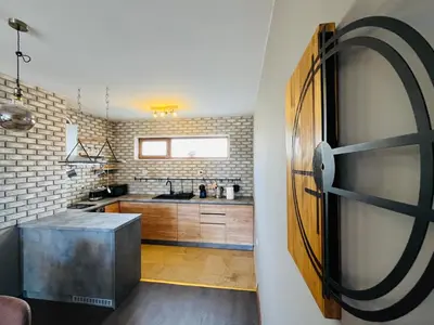 a kitchen with a sink and a counter top at Boris’s Guest Apartment in Chepelare