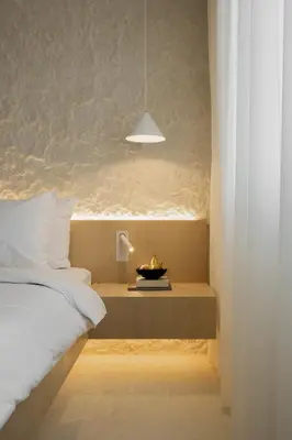 a bedroom with a bed and a table with a lamp at Hotel Hello Plovdiv - Free Parking and Pet Friendly in Plovdiv