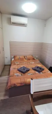a bedroom with two beds in a room at Blue sea in Sofia