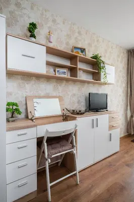 a white desk with a computer in a room at Vitosha Boulevard Studio in Sofia