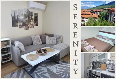 a living room with a couch and a coffee table at apartment Serenity, Bansko in Bansko