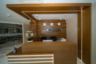 an office with a reception desk in a building at Aurora Sofia in Sofia