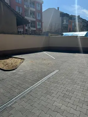 an empty parking lot in a building at Lux City Apartment, free parking in Pazardzhik