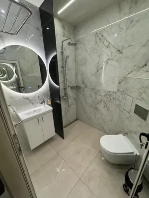 a bathroom with a shower and a toilet and a sink at Luxurious House with Deluxe rooms & Free Secured Parking in Sofia