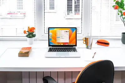an office desk with a laptop computer on it at 2BR Downtown Suit Next to Nevski Cathedral - AC in Sofia