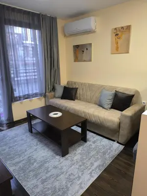 a living room with a couch and a coffee table at Mountain Heaven Retreat with free Bottle of Wine close to Gondola, free Parking in Bansko