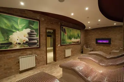a waiting room with five chairs and paintings on the walls at Cozy Studio in Semiramida Gardens - Borovets Hills 39 in Borovets