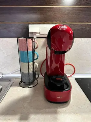 a red blender sitting on top of a counter at Pirin Sky in Bansko
