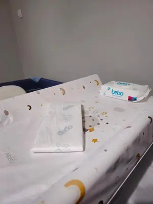 a hospital bed with a knife and a napkin on it at Mladost Sofia, close to Metro Station and Center in Sofia