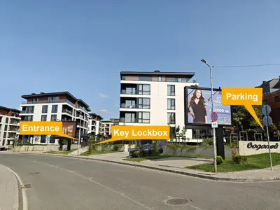 an empty street with signs on the side of a building at Gran Capital - Mountain View, FREE Parking in Sofia