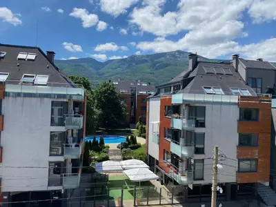 an aerial view of two buildings and a swimming pool at Gran Capital - Mountain View, FREE Parking in Sofia