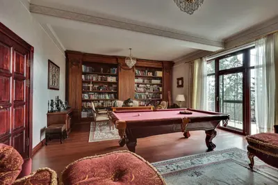 a living room with a pool table in it at AMARI PARK Residence in Golyama Zhelyazna