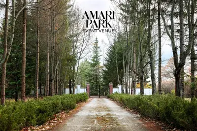 a dirt road with trees and a sign that reads arm park every temple at AMARI PARK Residence in Golyama Zhelyazna