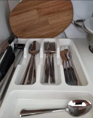 a white kitchen sink with utensils on a counter at Studio Vihren 11,Bansko in Bansko