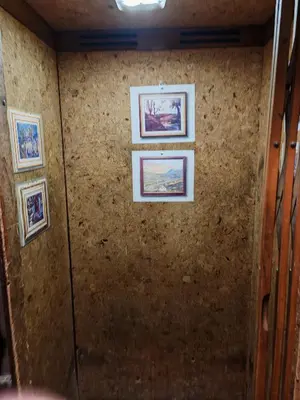 a wall with four pictures on it at Apartament 88 in Sofia