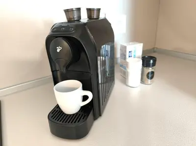 a coffee maker with a cup on a counter at Modern design 1 bdrm, 4 guests, Top cente, Near Parliament, Self check-in in Sofia