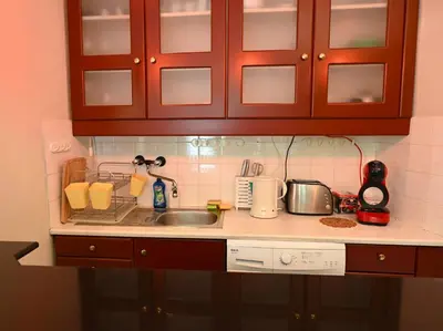 a kitchen with a sink and a counter top with a sink at Urban Oasis Studio in Sofia