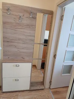 a dressing room with a mirror and a white drawer at Апартамент - Студио Престиж 3 in Hisarya