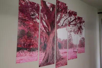 four paintings of a tree on a wall at Top Center Retreat, Near AUBG FREE Parking in Blagoevgrad