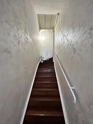 a staircase in a building with a stair case at Smile House in Plovdiv