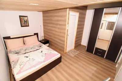 a bedroom with a bed in a small room at Swan7 Studios in Plovdiv