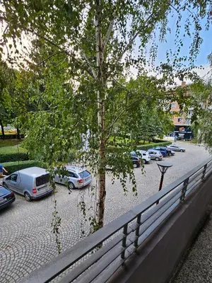 a group of cars parked in a parking lot at Апартамент Лилия in Gotse Delchev