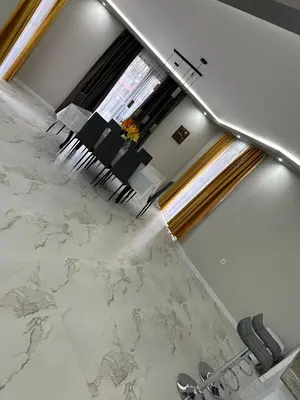 a bathroom with a marble counter top and a mirror at The Hillside Villa in Ognyanovo