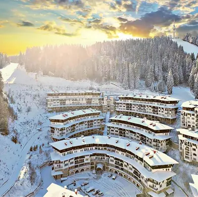 an aerial view of a resort in the snow at Yanevi Apartments at Grand Monastery Pamporovo in Pamporovo